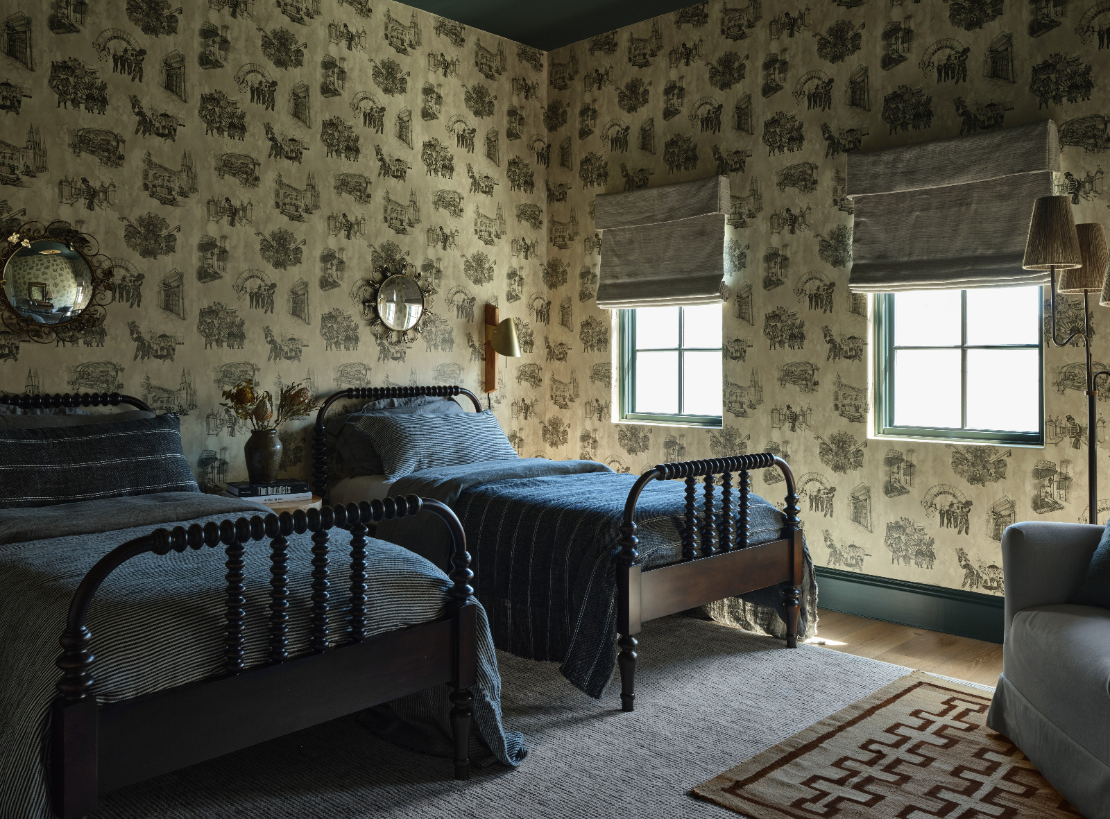The guest bedroom with whimsical wallpaper in a home designed by Shane & Pierce in Dallas, Texas