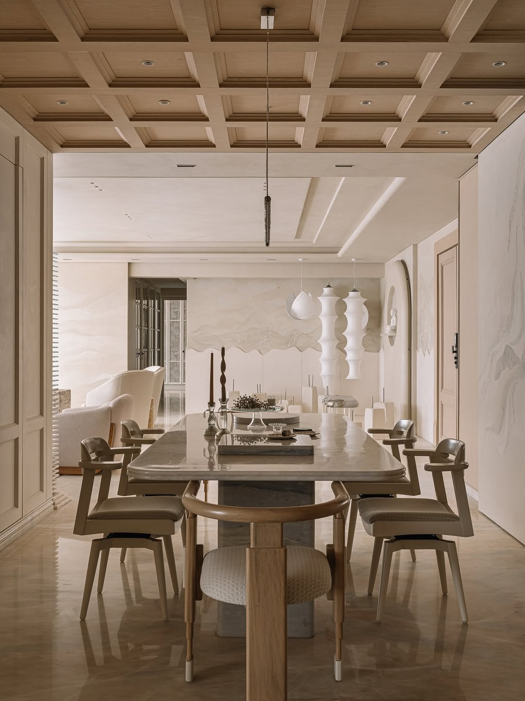 The medium-oak coffered ceiling overhead grounds the dining area with warmth