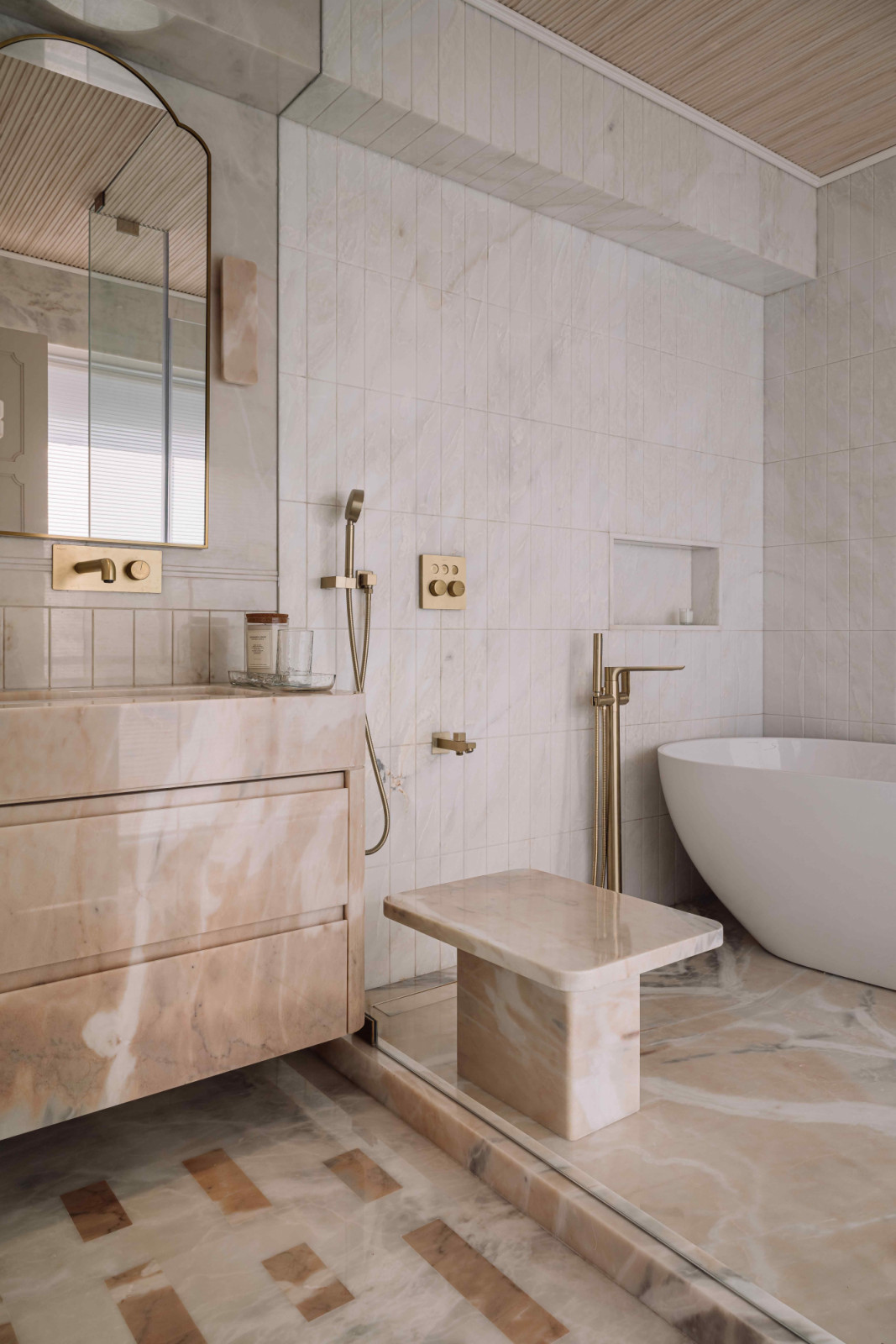 The clearly demarcated bathing and vanity zones in the main ensuite