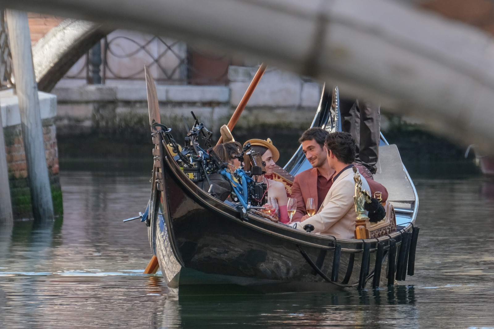 VENICE, ITALY - AUGUST 23: Lily Collins and Eugenio Franceschini is seen filming on the set of "Emily In Paris" on August 23, 2025 in Venice, Italy. (Photo by Stefano Mazzola/GC Images)