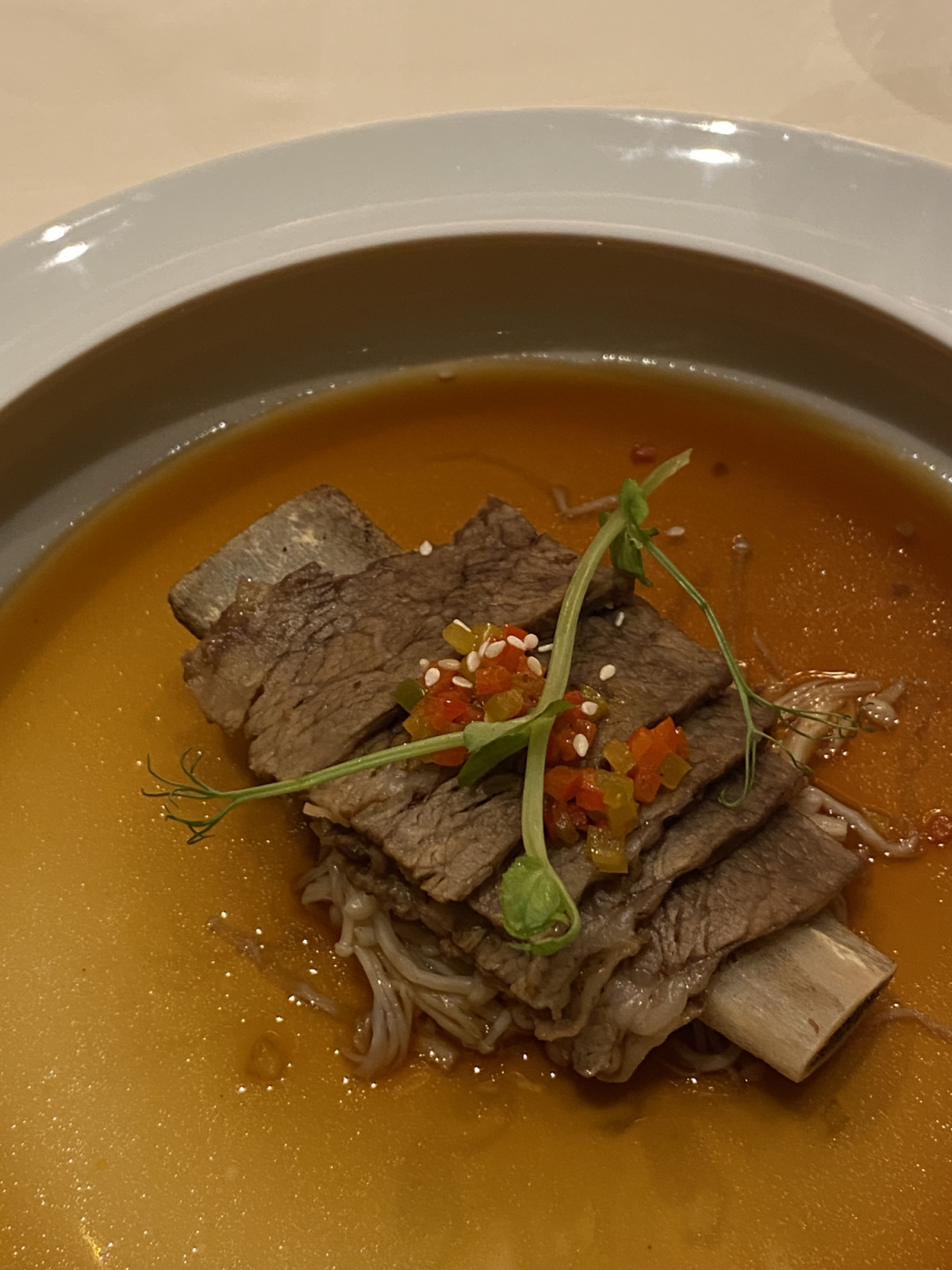 Red Lantern: braised beef short ribs, drenched in Sichuan spicy sauce with Chinese herbs and seasonal vegetables (Photo: Celeste Goh)