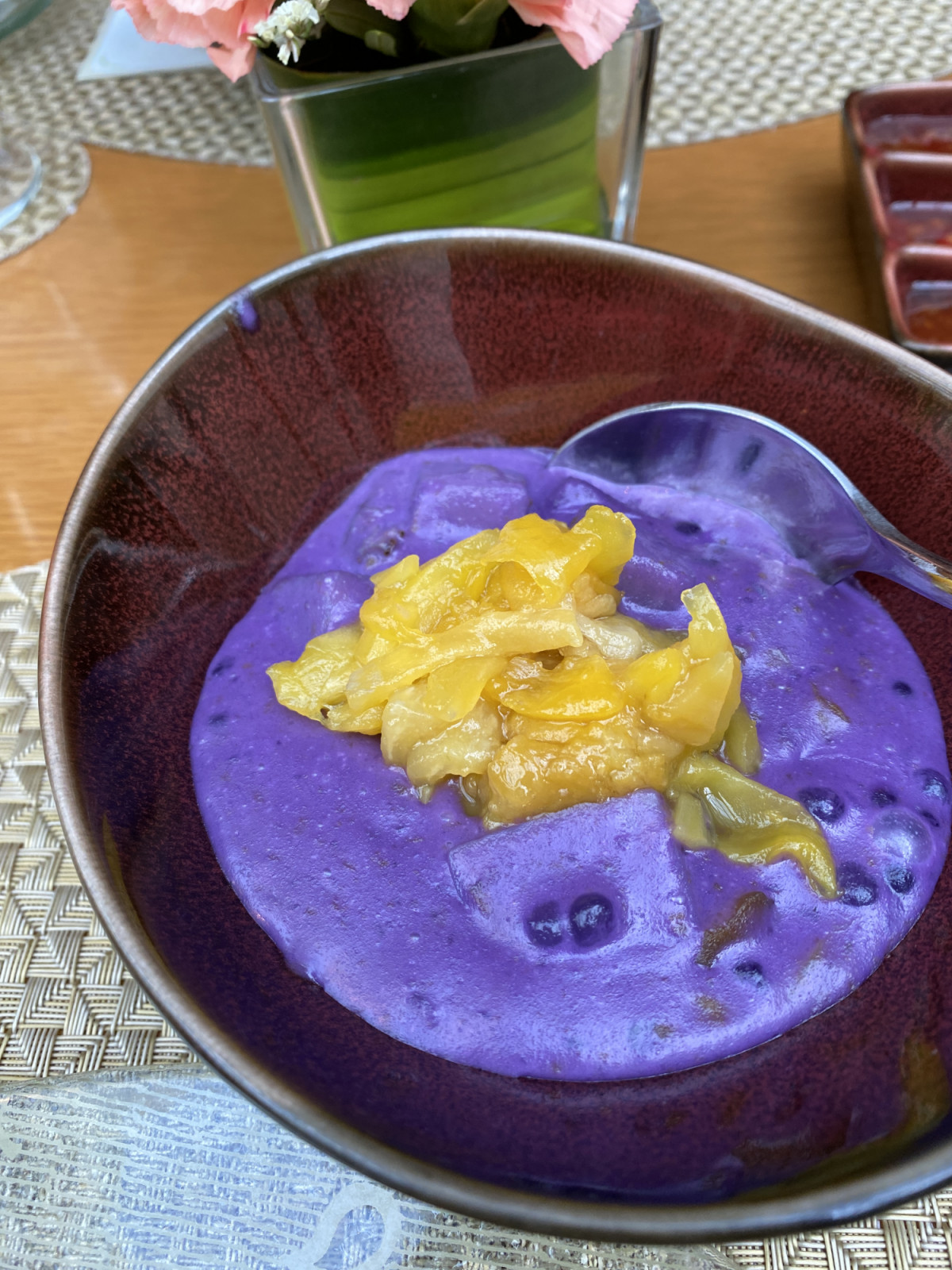 The vibrant ginatang bilo bilo with a plethora of ube, gabi, camote, glutinous rice balls and langka (Photo: Celeste Goh)