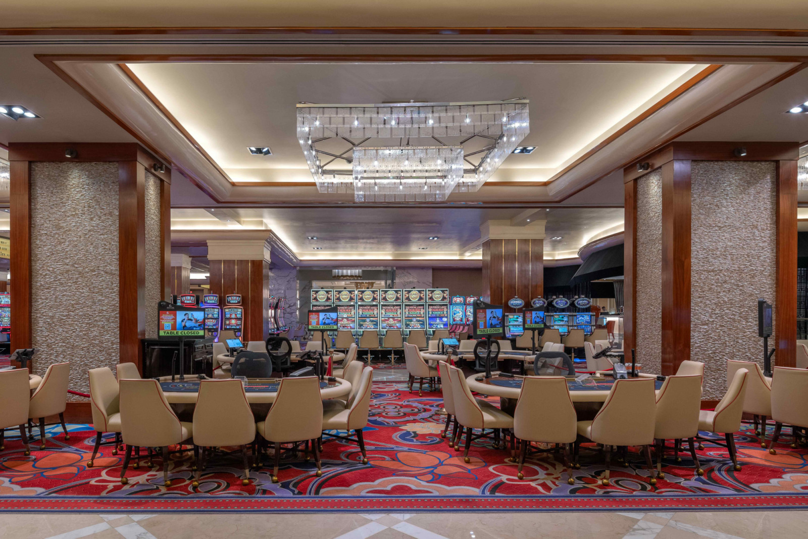 The expansive casino offers an array of slot machines and table games