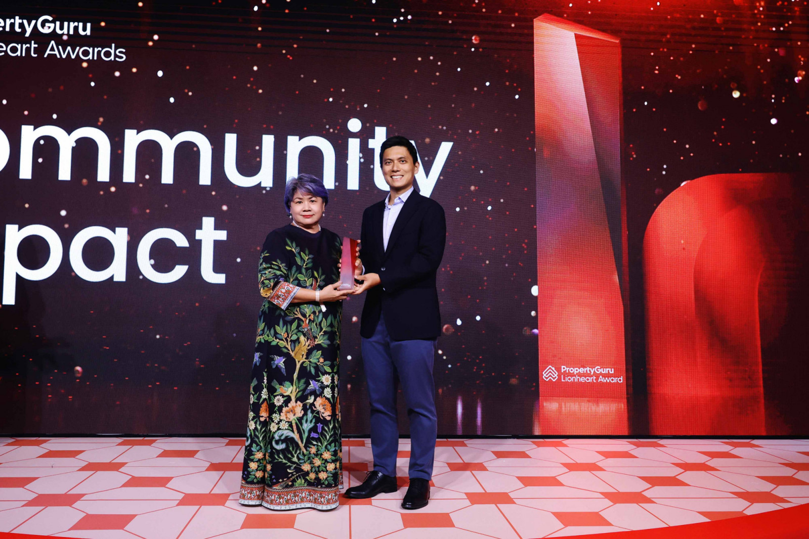 Serene Goh from ERA Realty Network receiving the Community Impact Award at the PropertyGuru Lionheart Awards 2025
