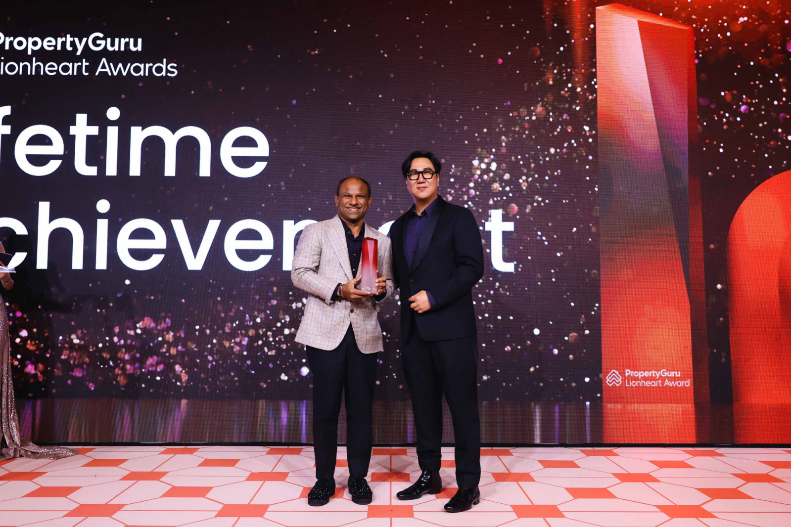 Ismail Gafoor, Executive Chairman of PropNex, accepting the Lifetime Achievement Award at PropertyGuru Lionheart Awards 2025