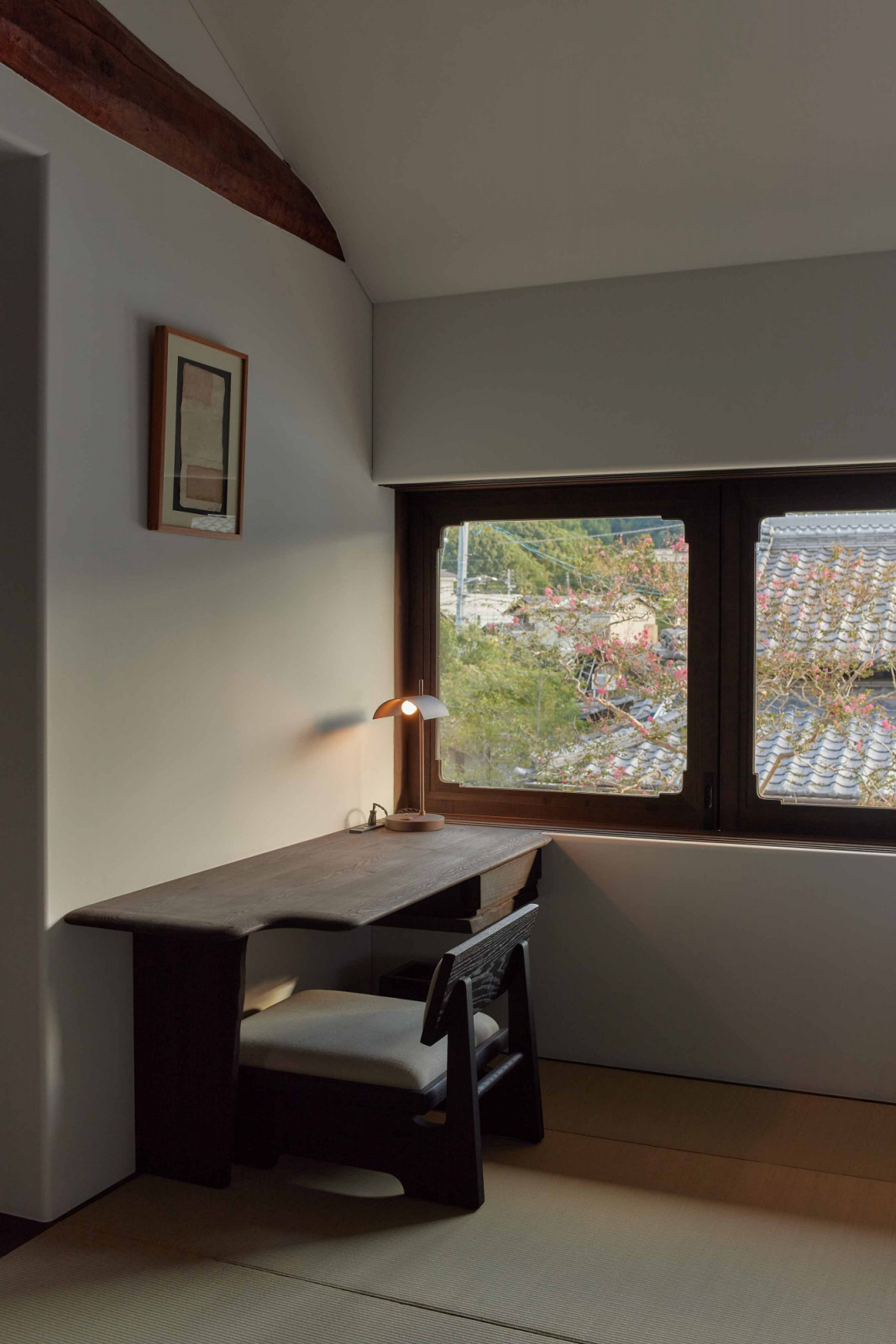A corner desk area with a view inside Yoruya’s standard room
