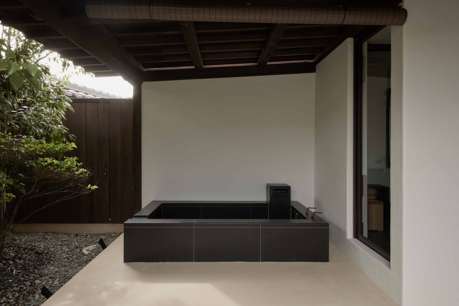 The Yoruya suite’s outdoor bath overlooks the greenery