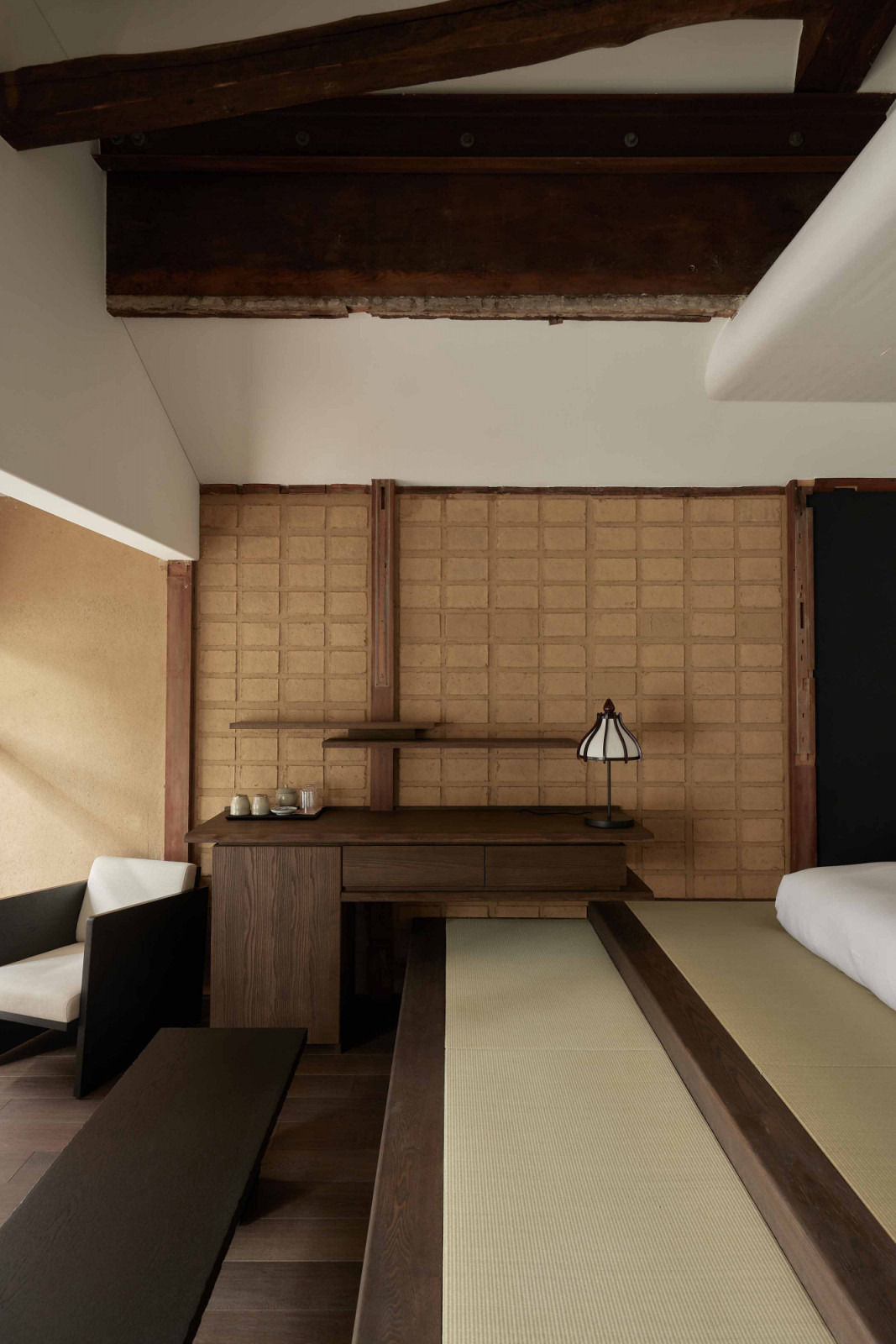The junior suite’s bed area is also replete with textures