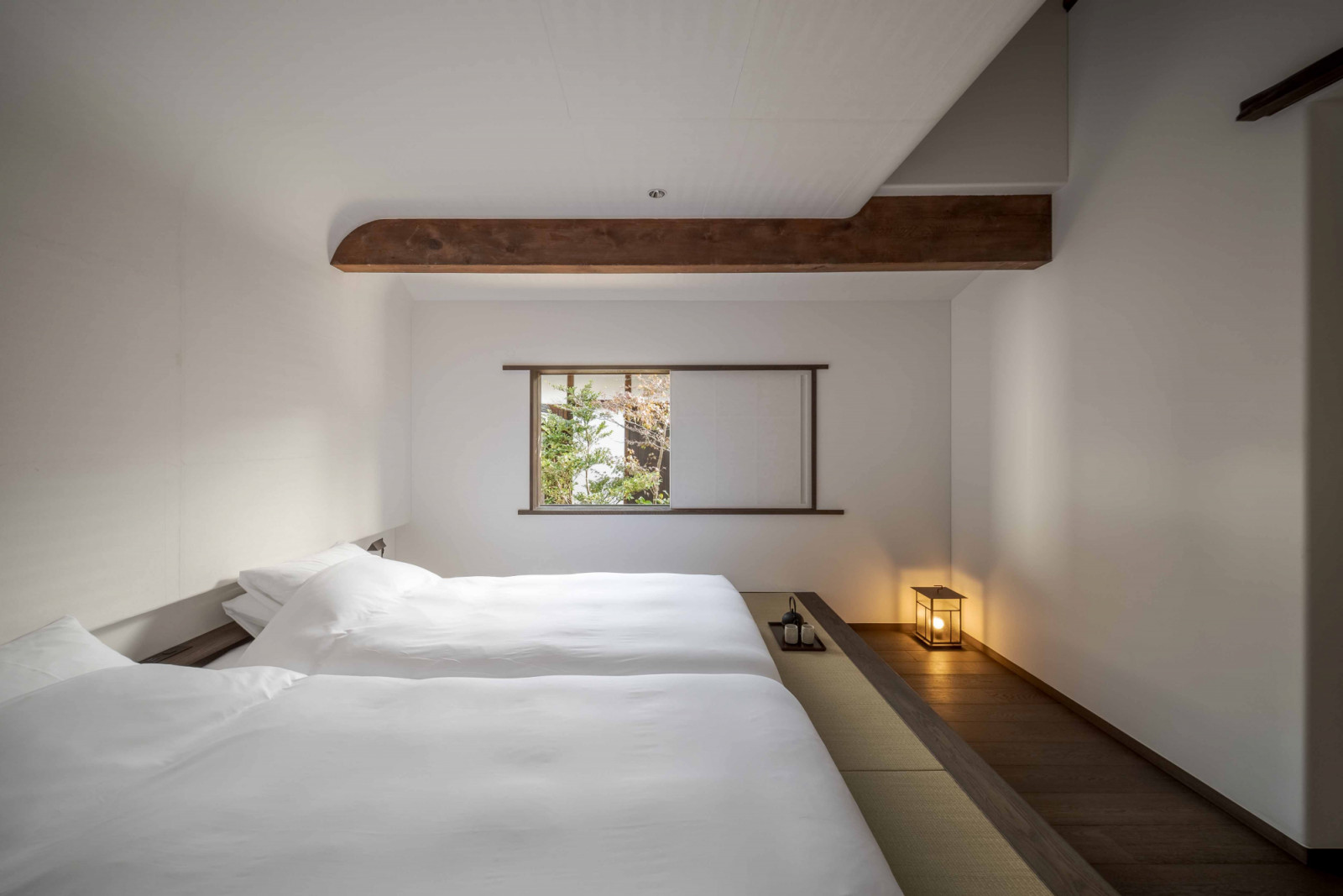 One of the suite’s bedrooms with a picture window