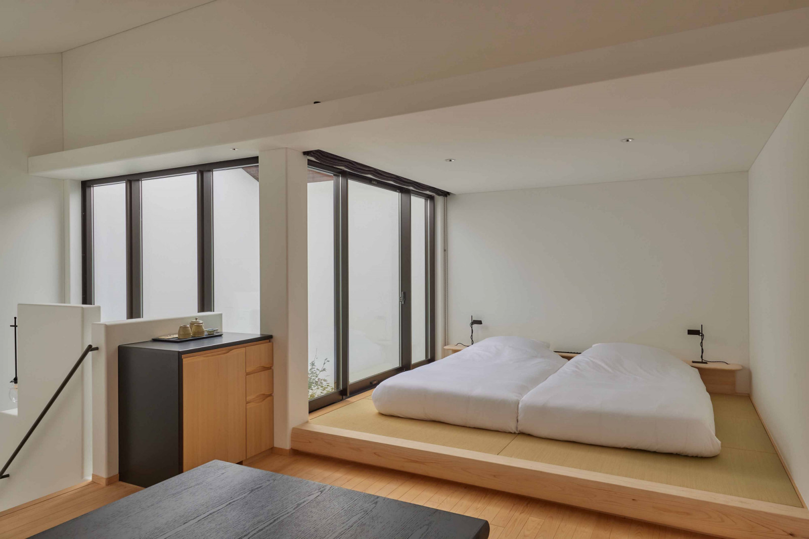 Interior of the shikkui maisonette’s bed area