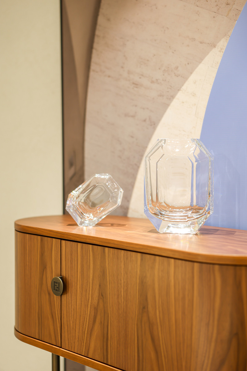 Inspired by the octagonal tassel found on Baccarat chandeliers, these sculptural vases combine sharp cuts and gentle curves to refract light like a finely cut gemstone