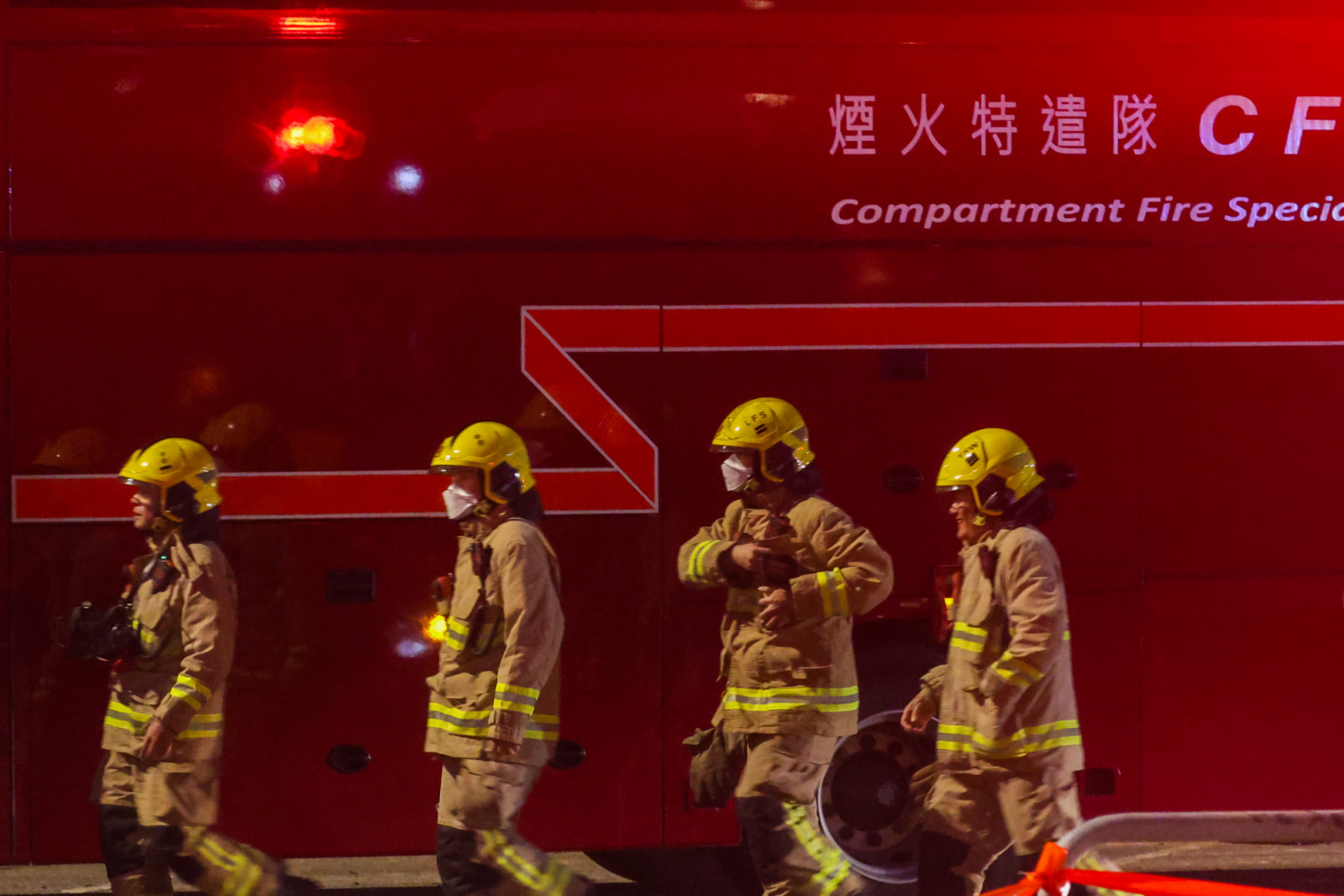 TAI PO, HONG KONG - NOVEMBER 27: Fighters are deployed to the scene as rescue efforts continue at the Wang Fuk Court residential buildings, in Tai Po, Hong Kong, on November 27, 2025. Hong Kong said on Thursday that it contained its deadliest fire in decades, a blaze that ripped through a residential complex in Tai Po, killing 65 people and leaving 280 others unaccounted for, according to local media. So far, 65 people have died, including a firefighter, and 70 have been injured, including 10 firefighters,