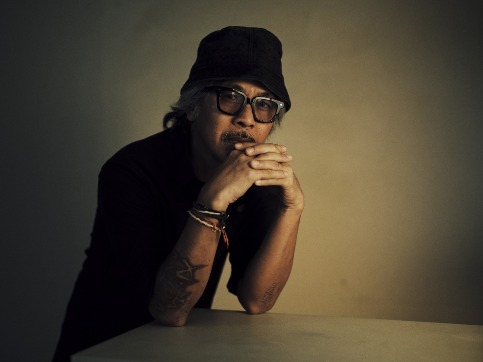 TORONTO, ONTARIO - SEPTEMBER 08: Lav Diaz of "Magellan" poses in the Getty Images Portrait Studio Presented by IMDb and IMDbPro during the Toronto International Film Festival at InterContinental Toronto Centre on September 08, 2025 in Toronto, Ontario. (Photo by Gareth Cattermole/Getty Images for IMDb)