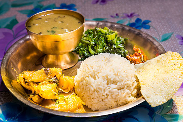 A staple of everyday Nepalese meals, Dal Bhat combines lentil soup and rice for a balanced, nourishing plate (Photo: The Wonder Nepal)