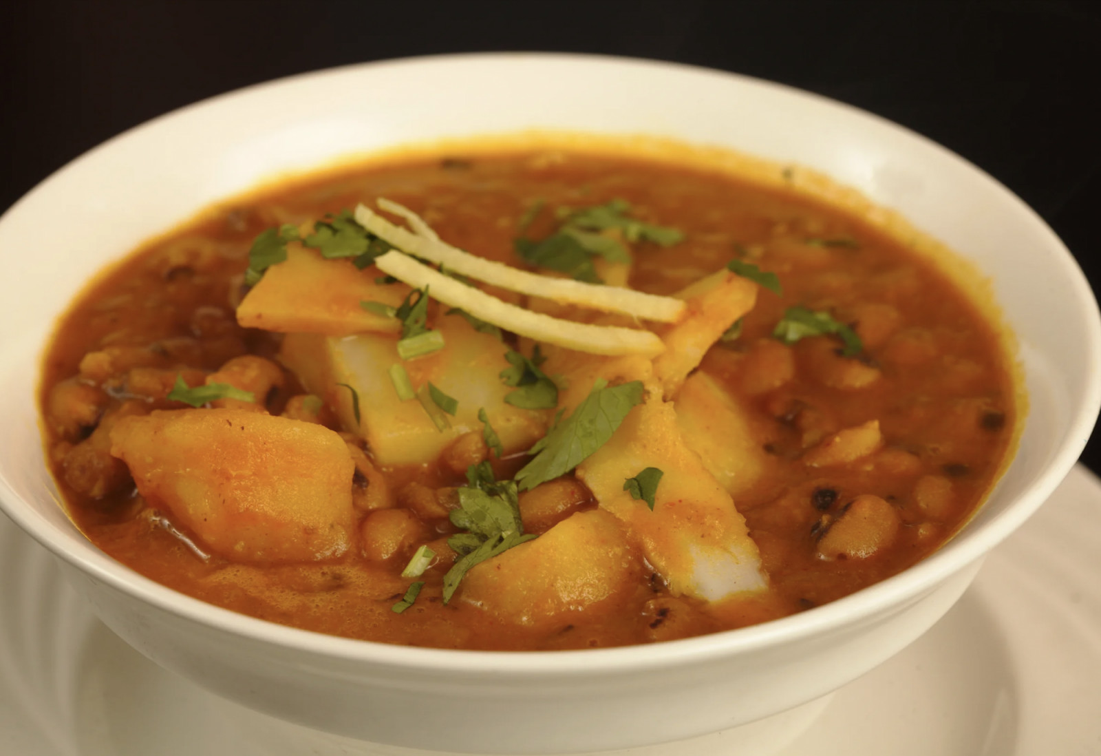 Potatoes meet bamboo shoots in this subtly spiced, tangy curry, highlighting seasonal Nepalese flavours (Photo: Himalayan Heritage)