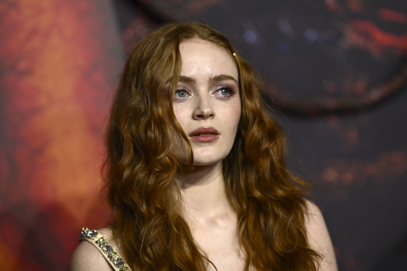 Known for her red hair and effortless style, Sadie Sink blends classic tailoring with subtle modern touches in every look (Photo by Gareth Cattermole/Getty Images)