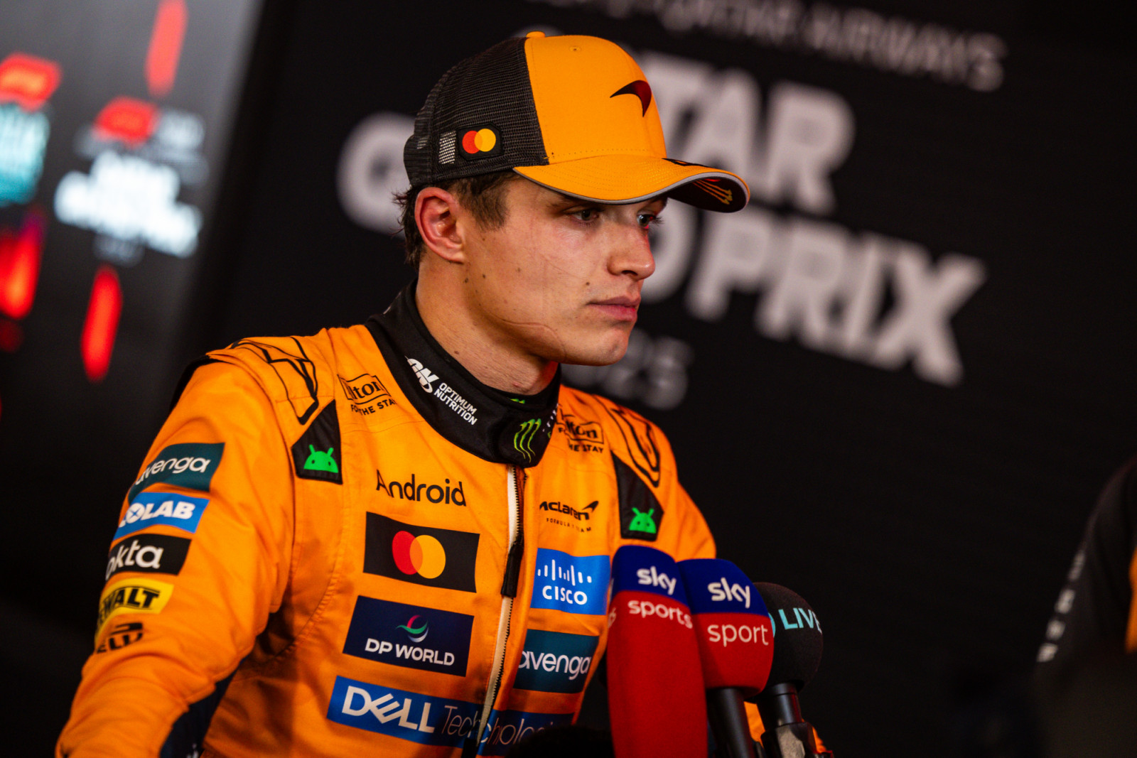LUSAIL CITY, QATAR - NOVEMBER 30: A disappointed Lando Norris of Great Britain and McLaren answers questions in the TV media pen during the F1 Grand Prix of Qatar at Lusail International Circuit on November 30, 2025 in Lusail City, Qatar. (Photo by Jayce Illman/Getty Images)