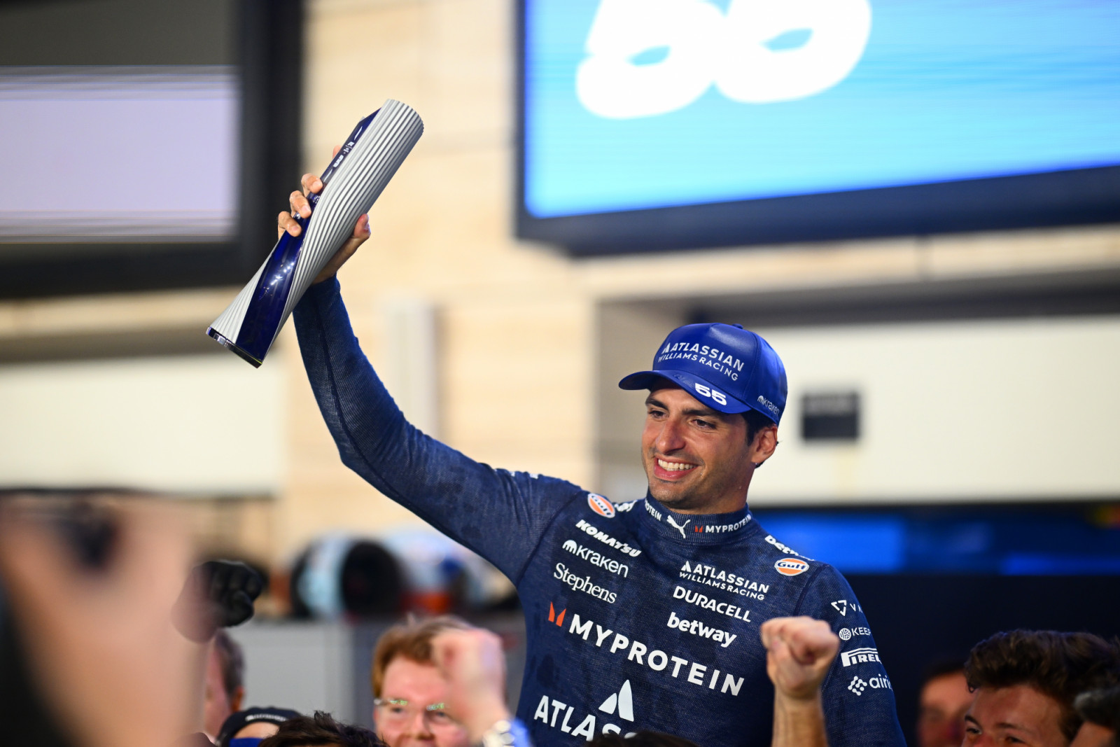 LUSAIL CITY, QATAR - NOVEMBER 30: Third placed Carlos Sainz of Spain and Williams and the Williams team celebrate during the F1 Grand Prix of Qatar at Lusail International Circuit on November 30, 2025 in Lusail City, Qatar. (Photo by Clive Mason/Getty Images)