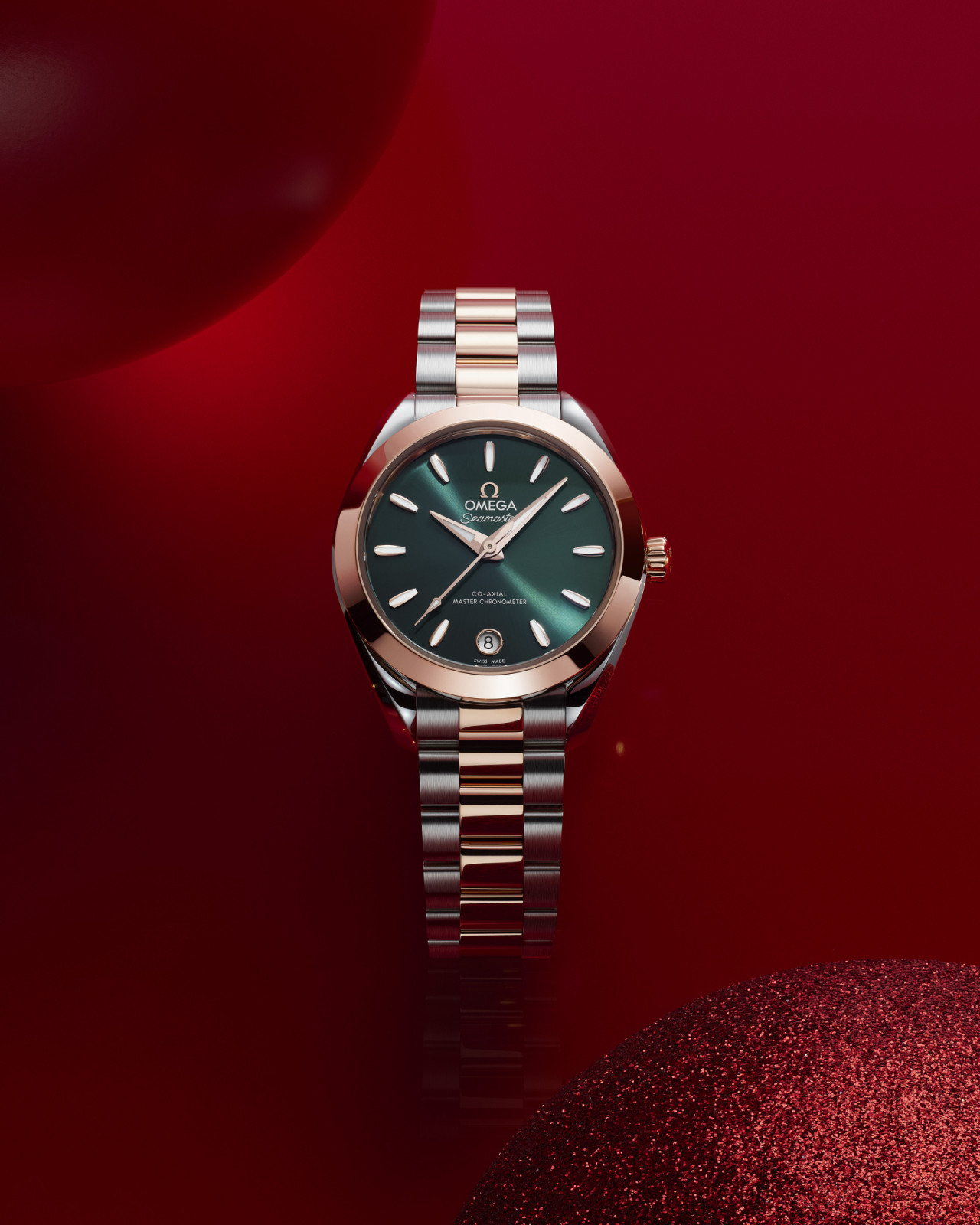 Omega Seamaster Aqua Terra in stainless steel and Sedna gold with pine green dial