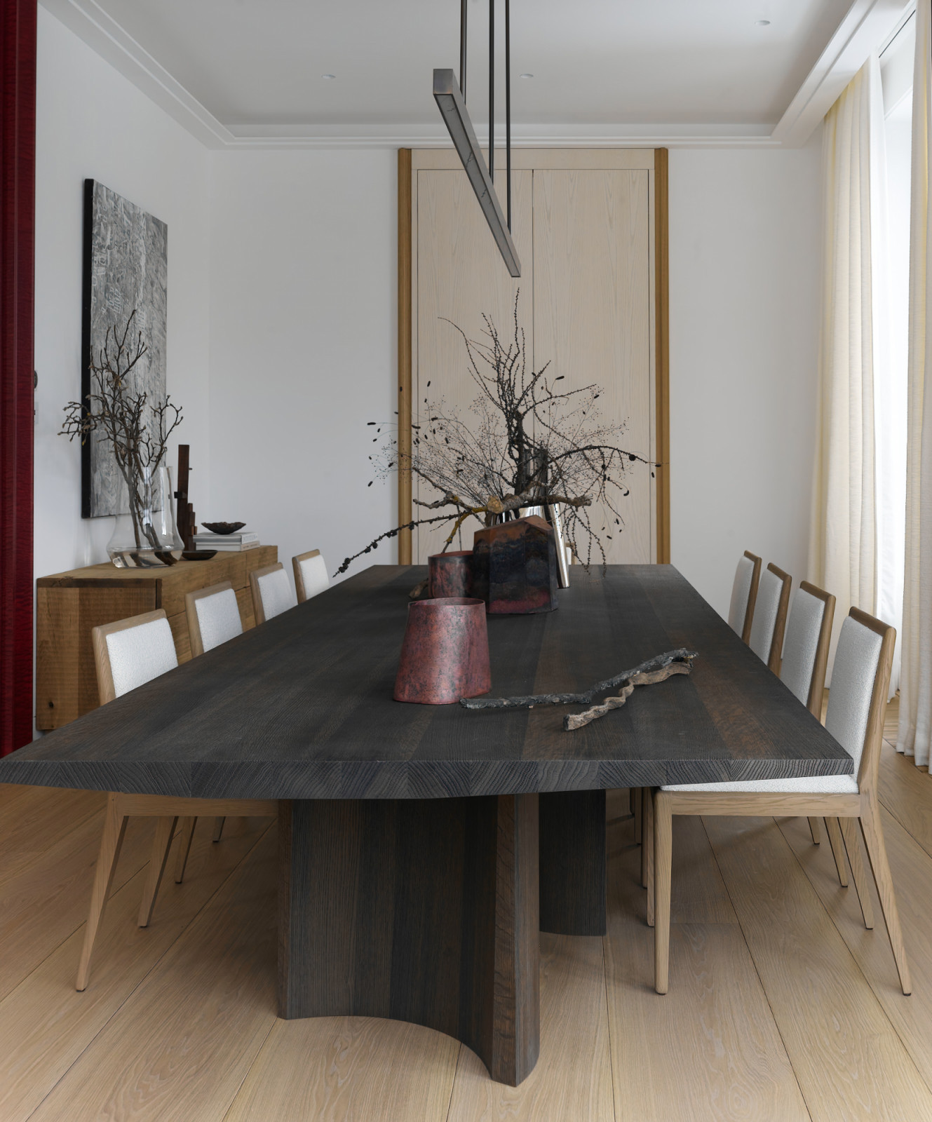 A sculptural table by Christophe Delcourt anchors the dining room (Photo: Ilya Klimov)