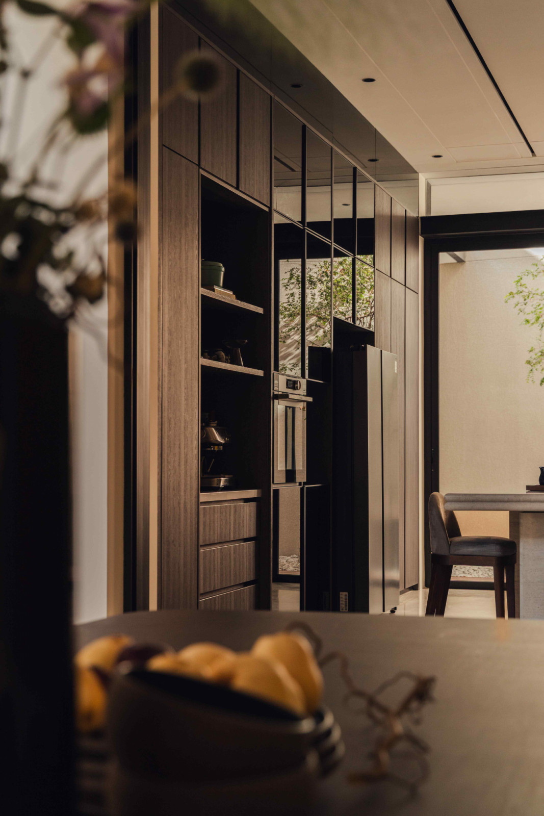 Dark oak cabinetry exudes warmth and texture