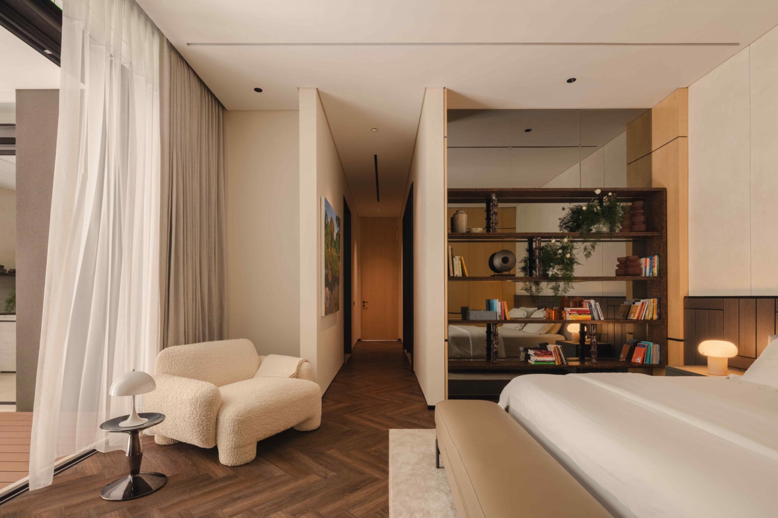 Dark herringbone oak flooring and tan leather accents to add depth and colour to the intimate space
