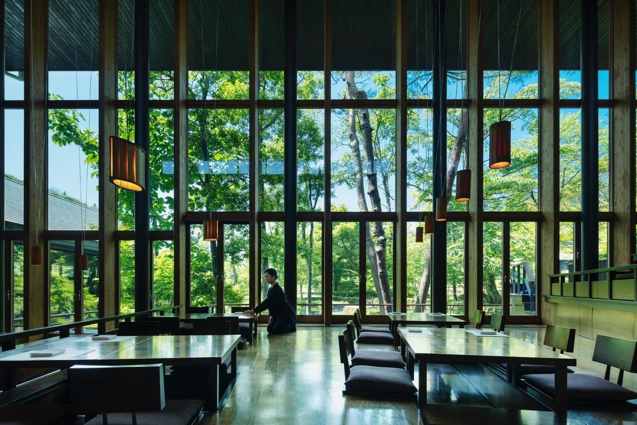 Tables and seating at Kasuke maintain low profiles to preserve valley views, allowing the river and forest to dominate the dining experience