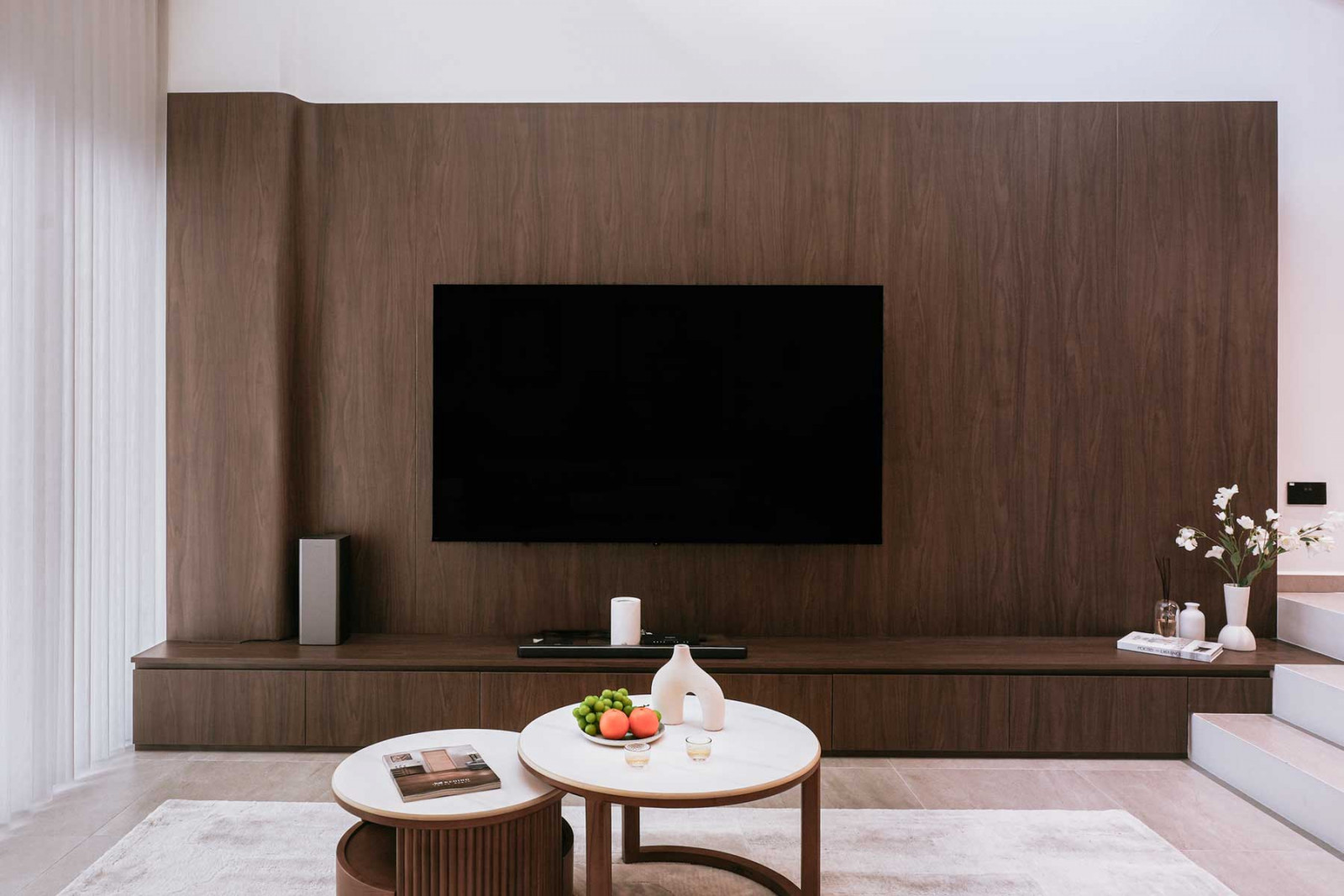 The three-storey home is intentionally zoned to support the rhythms of a family of seven; the ground floor is an elderly-friendly suite, the second floor is dedicated to the children, while the top floor houses the master suite and another bedroom