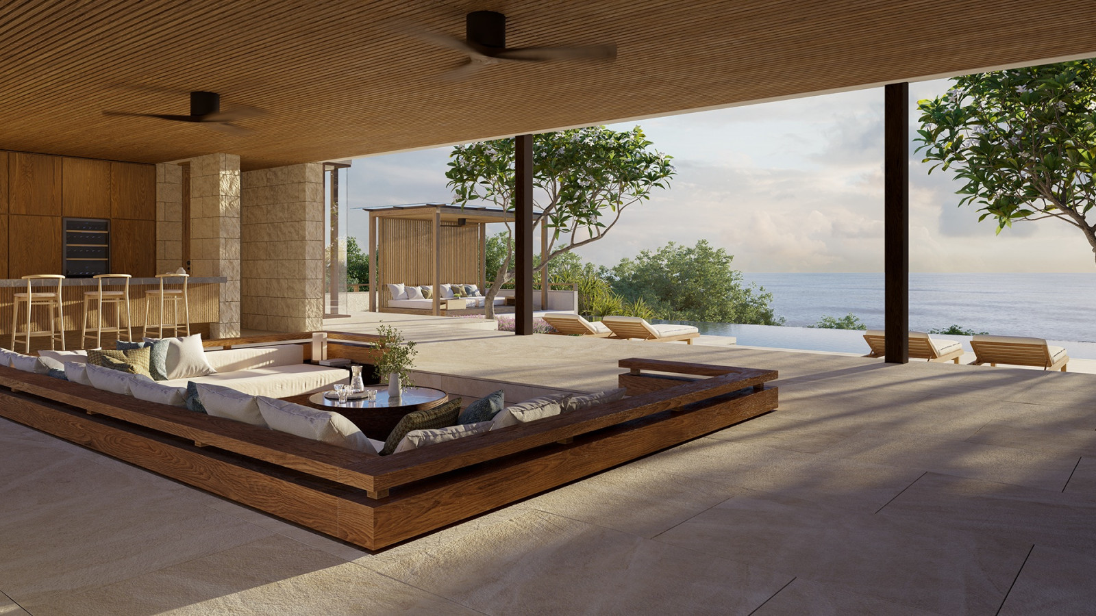 Living spaces extend seamlessly to outdoor pavilions with 15- to 20-metre infinity pools positioned to capture ocean views and prevailing breezes