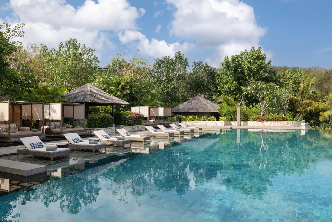 Raffles Bali's main pool is set within richly layered tropical landscaping