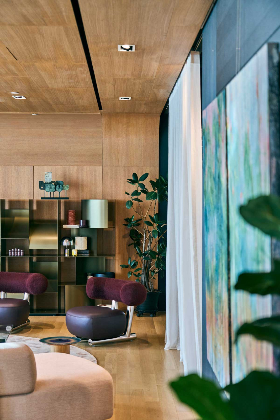 The Pipe armchair by Sebastian Herkner in burgundy
