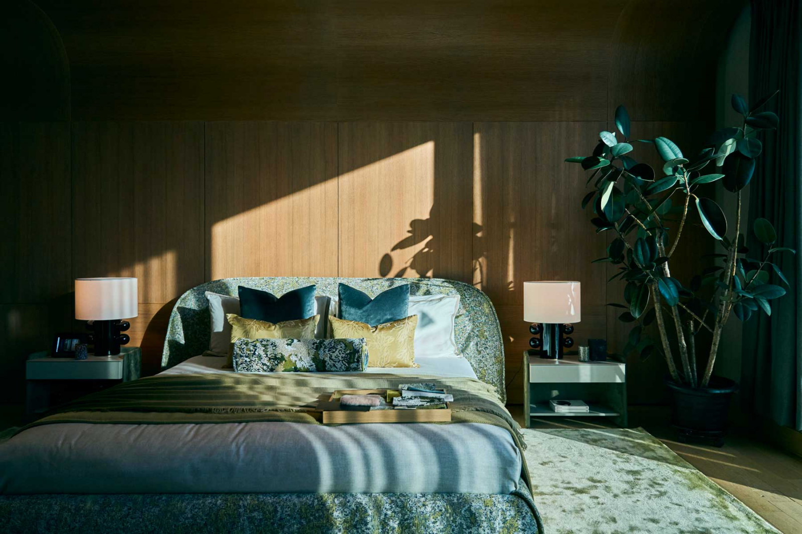 A poetic play of light elevates this cosy bedroom setting