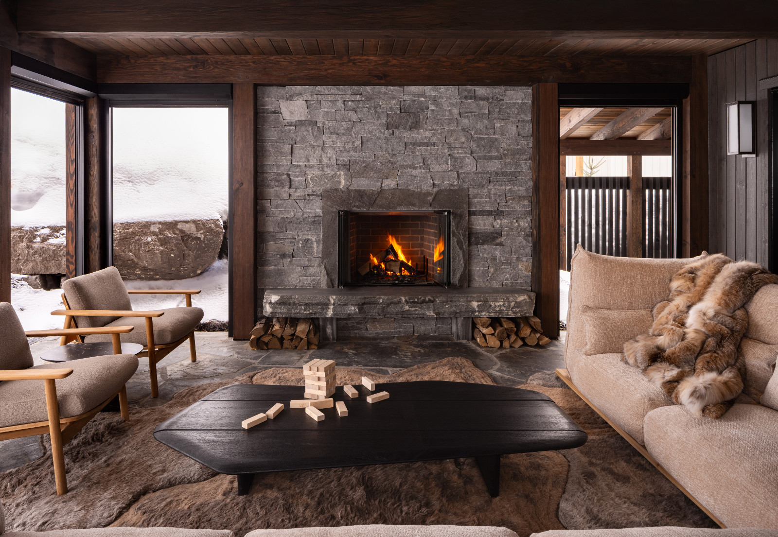 The living room of a renovated ski chalet in Quebec, Canada, designed by ACDO
