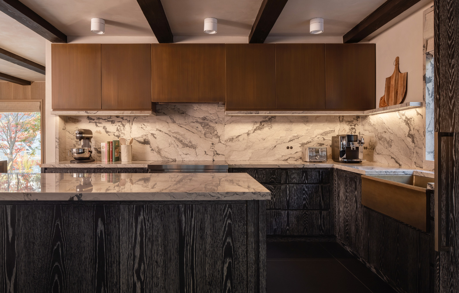The kitchen of a renovated ski chalet in Quebec, Canada, designed by ACDO