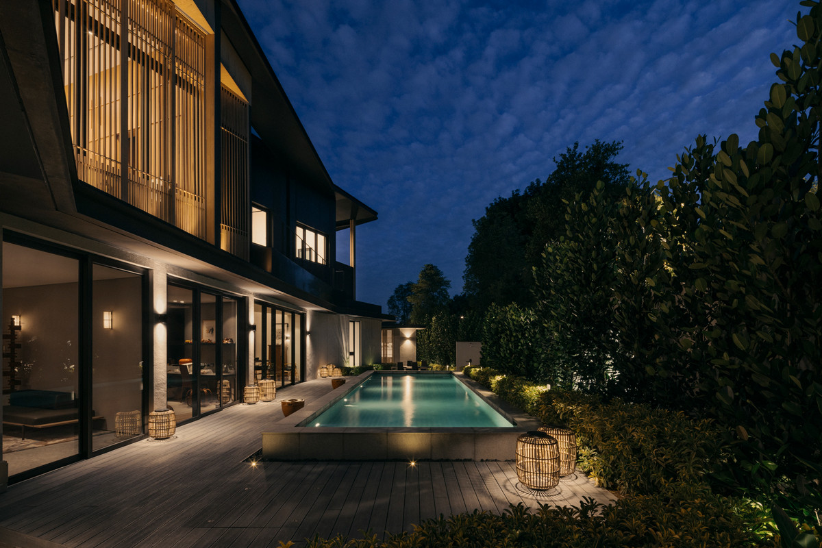 Come evening, the poolside shimmers with a soft radiance, a nod to the birdcage motif that informs the home’s character