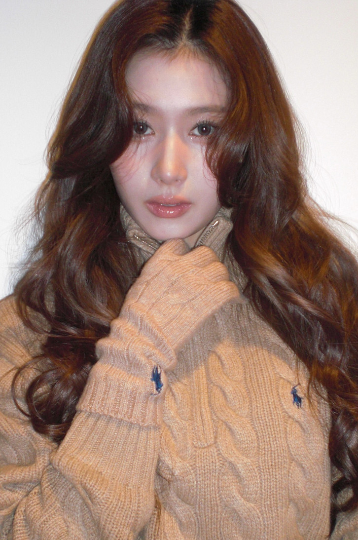 Sana embraces quiet luxury in her classic beige Ralph Lauren cable-knit sweater (Photo: m.by__sana / Instagram)