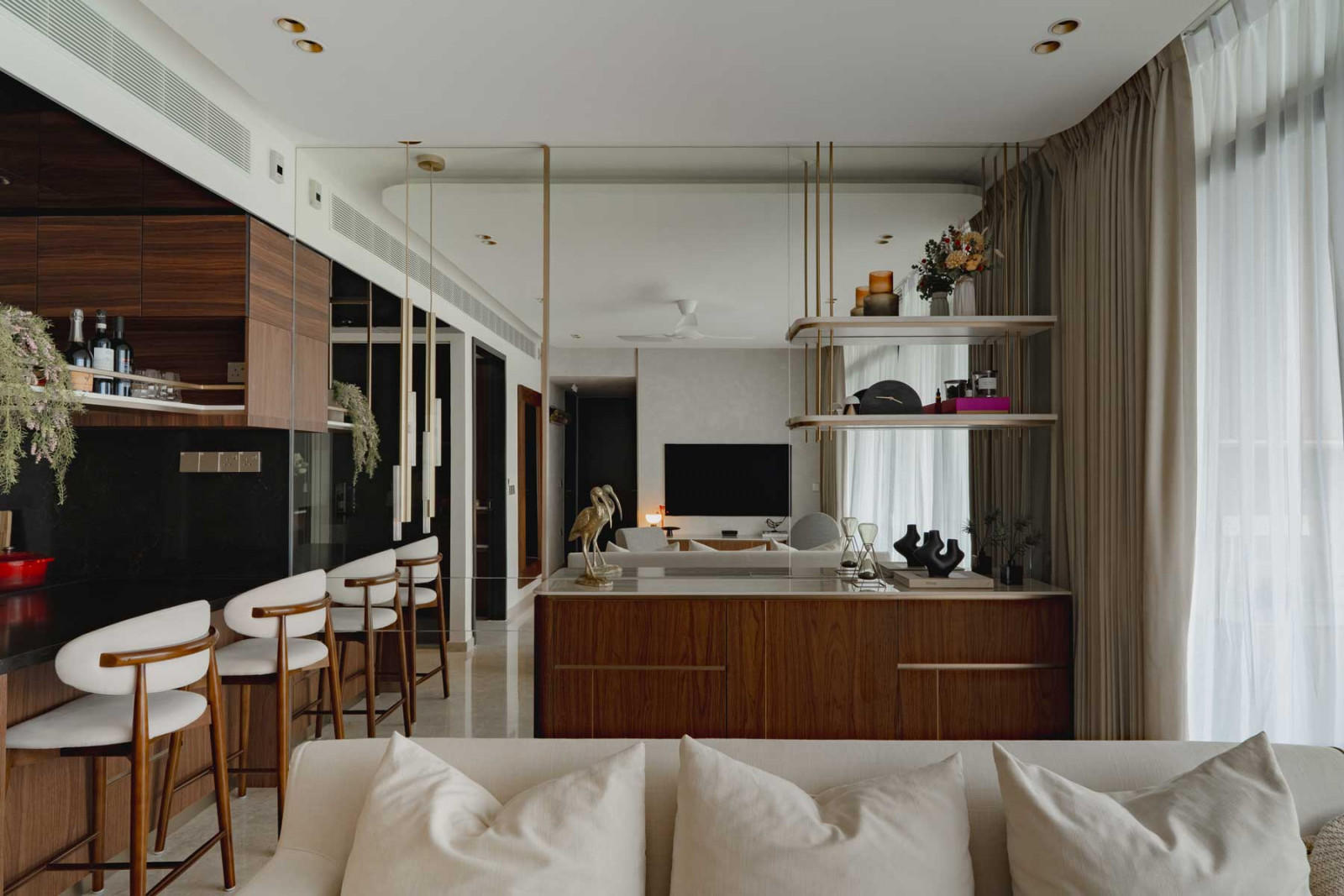 The overall design scheme pays homage to the occupants’ love of the outdoors via hushed tones and soft textures