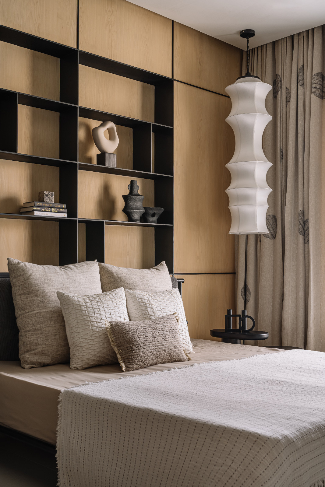 A Japandi-inspired bedroom in an Ahmedabad, India, home designed by Workshop Inc.