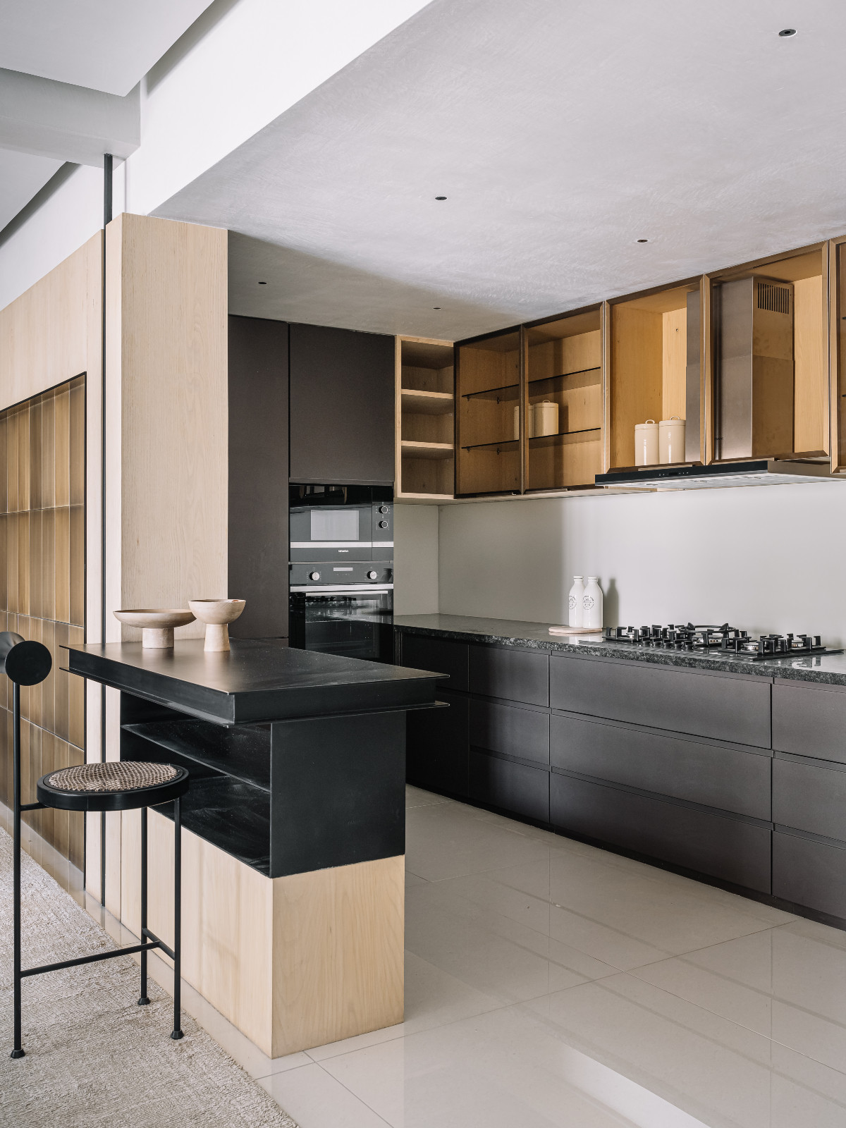 A Japandi-inspired kitchen in an Ahmedabad, India, home designed by Workshop Inc.