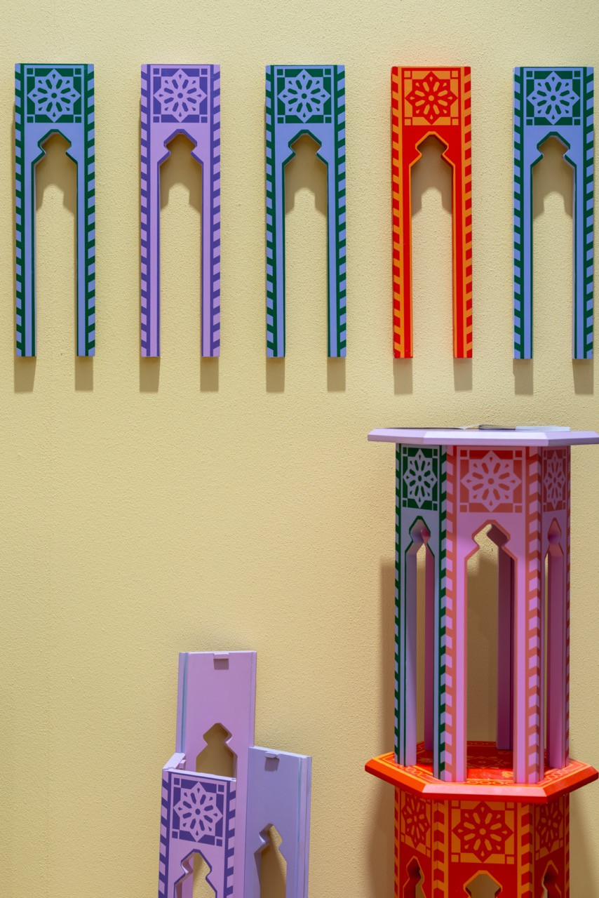 Zein Hageali’s Tawlitna collection showcases a modular table system in various colourways (lilac, green, red), featuring traditional Syrian arch motifs and geometric patterns that can be mixed and matched across different configurations