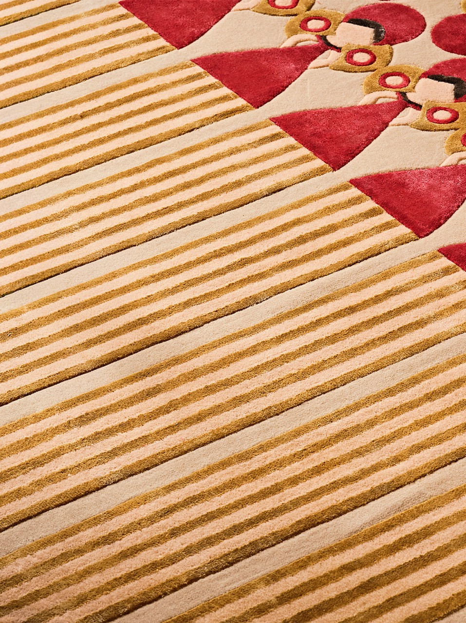 Aroosa references the foil-wrapped bride tradition in Egyptian Shay Al-Arosa tea through gold and cream stripes intersecting with red geometric forms