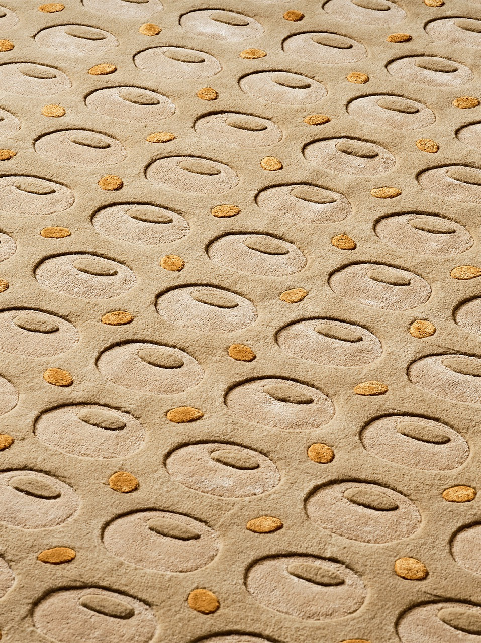 Kaak features repeating bread-shaped forms with golden accents on a cream ground, drawing from Middle Eastern baking traditions