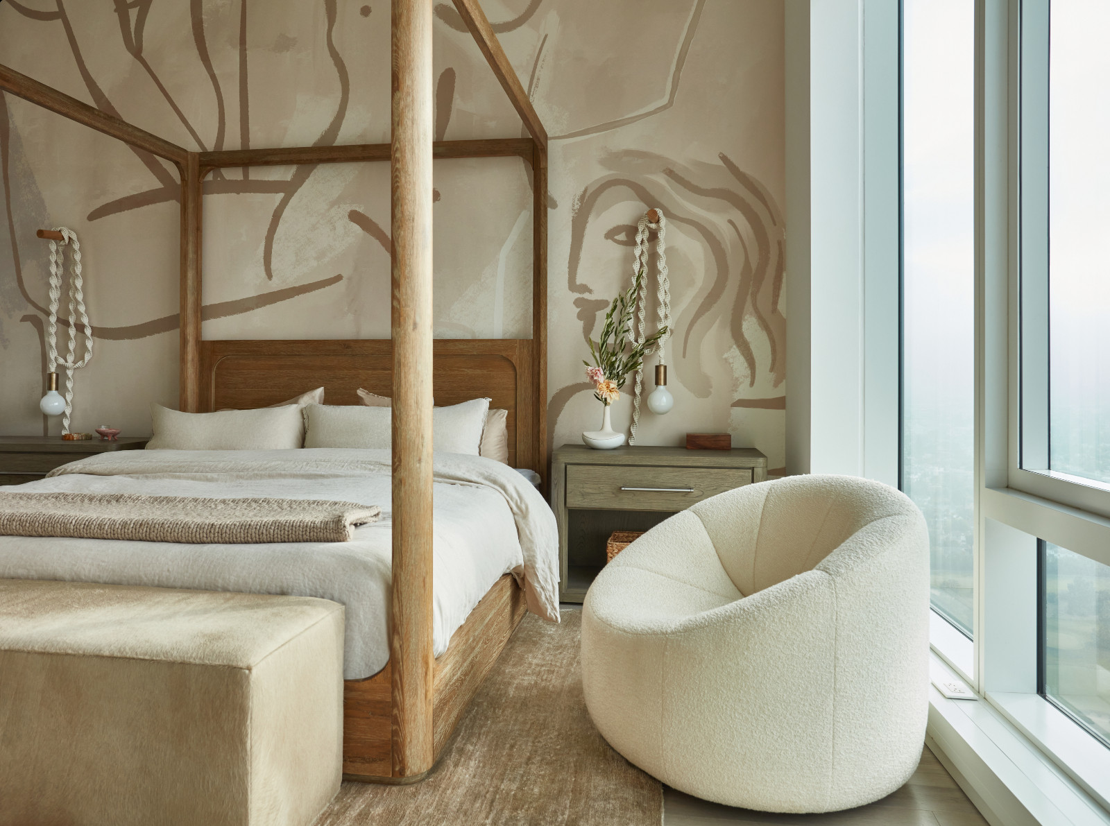 The bedroom of a young beauty entrepreneur's apartment in Los Angeles, designed by The Scale Collective