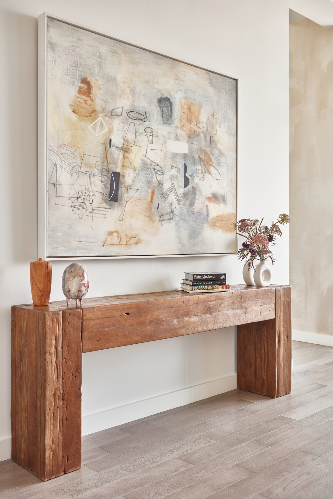 The entryway of a young beauty entrepreneur's apartment in Los Angeles, designed by The Scale Collective