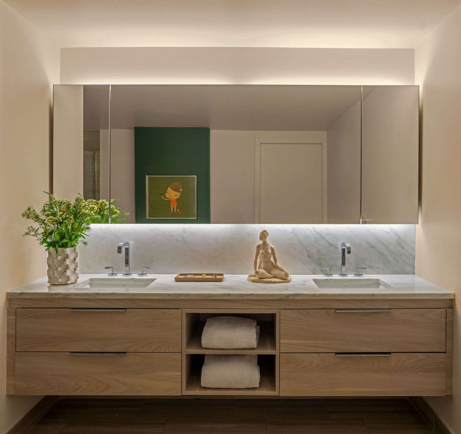 The bathroom of a young beauty entrepreneur's apartment in Los Angeles, designed by The Scale Collective
