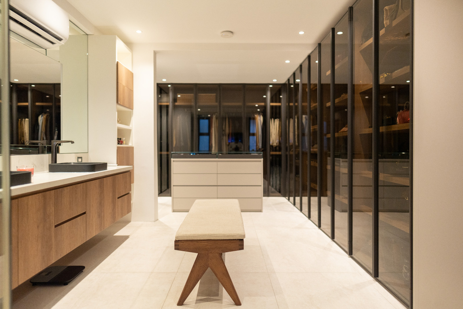 Pianca cabinetry in Pia Wurtzbach Jauncey's principal bedroom’s ensuite bathroom with tiles by The Tile Gallery
