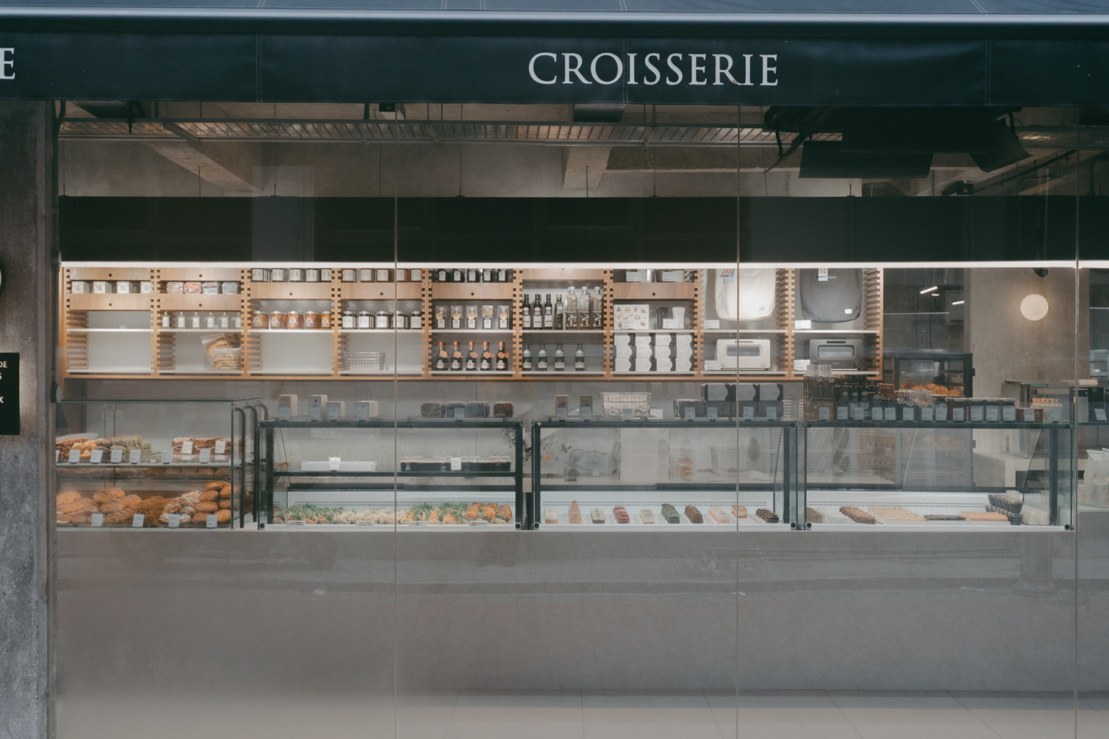 Designed by Studio Cocokacang, Croisserie Artisan Bakery balances the demands of a heavy-duty commercial kitchen with the warmth and approachability of a neighbourhood bakery