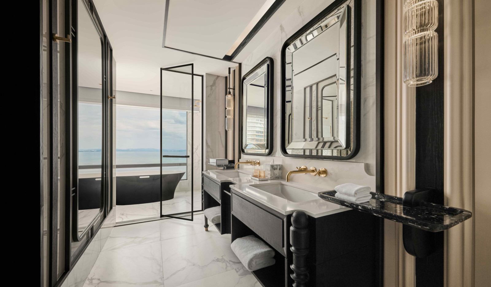 The understated veining and premium finish of the Silestone Et Calacatta Gold on vanity tops (Photo: Bingkha Studio)