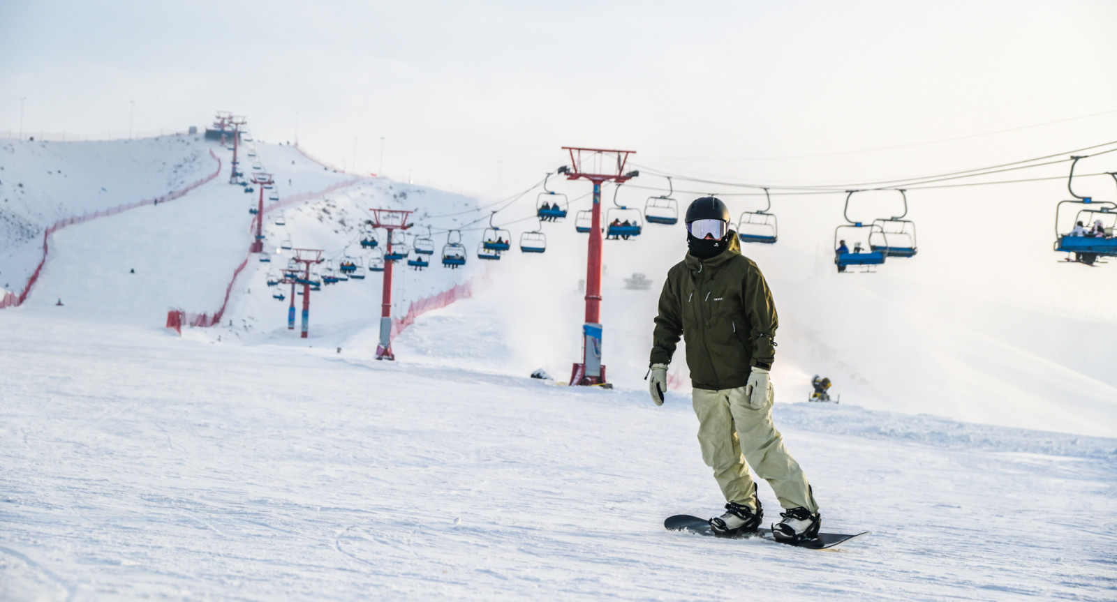 CHANGJI, CHINA - DECEMBER 14: A tourist enjoys skiing at Nu'erjia Ski Resort in winter on December 14, 2025 in Changji City, Changji Hui Autonomous Prefecture, Xinjiang Uygur Autonomous Region of China. (Photo by Tao Weiming/VCG via Getty Images)