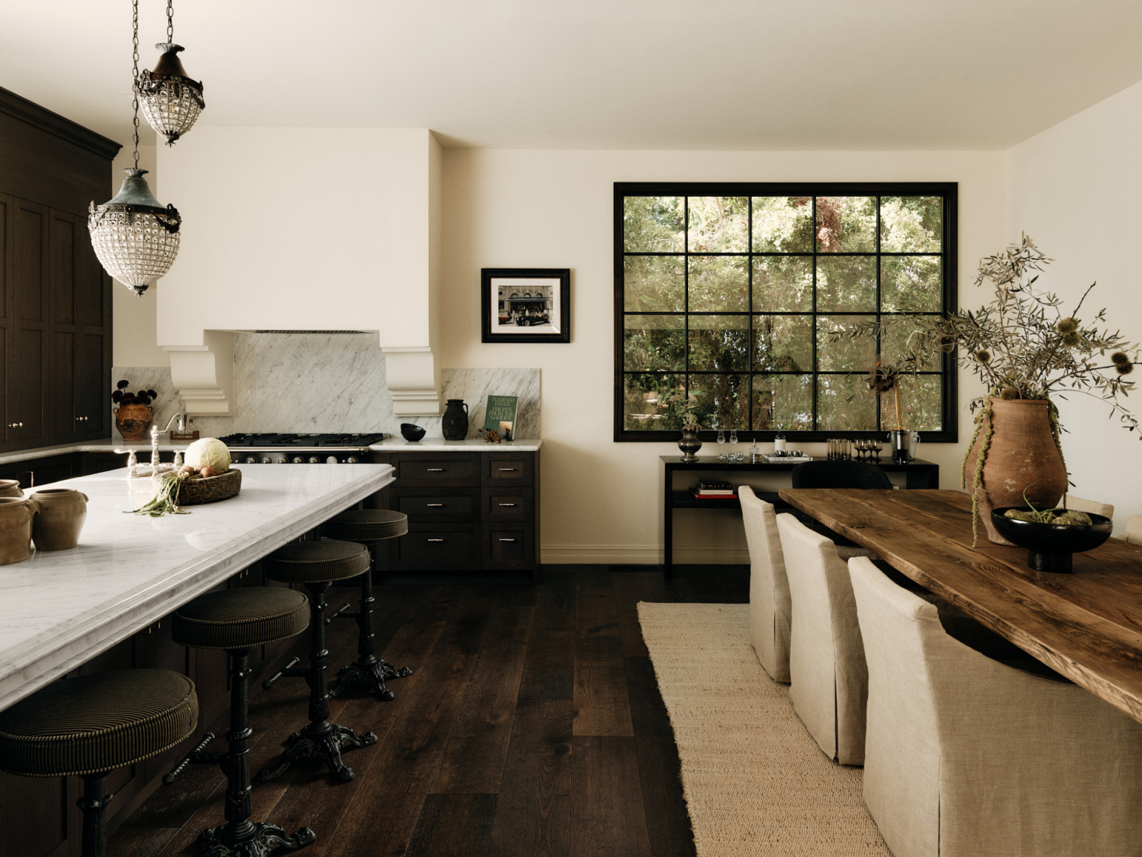 The kitchen and dining area of a Los Angeles, California home renovated by House of Rolison